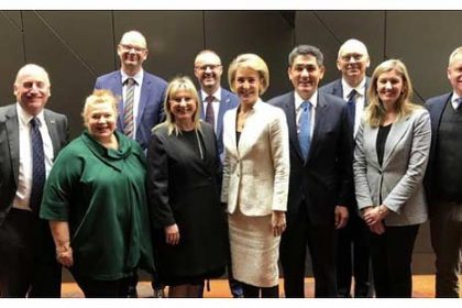 A group of professionals attends a COAG Skills Council meeting discussing the vet sector.