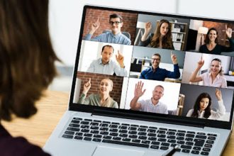 A video conference on a laptop illustrates the online learning experience for students in the vet sector.