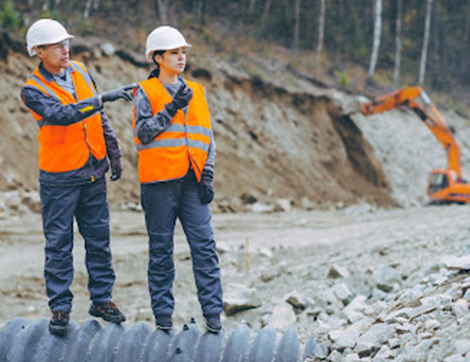 Construction workers inspect a Queensland worksite, highlighting growth in women entering the vet sector.