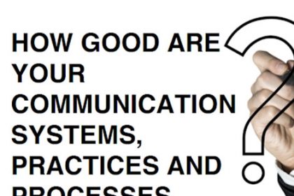 A hand points to questioning text about communication systems, highlighting the importance of vet compliance.