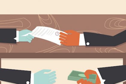 Hands exchanging money and a document illustrate concerns about bribery in the vet sector.