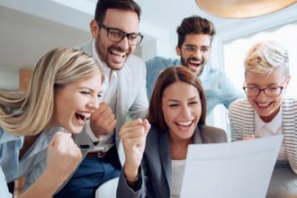 A business team collaborates on a document, representing a data-driven approach to vet sector improvements.