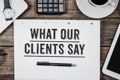 A notepad with client feedback sits on a desk, highlighting positive vet sector experiences.