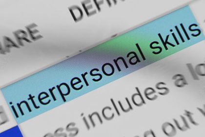 A document highlights interpersonal skills, a key attribute for trainers and assessors in the vet sector.