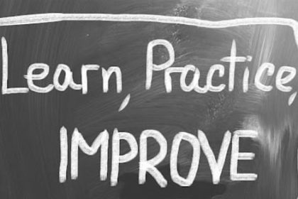 A chalkboard with the words 'Learn, Practice, IMPROVE' highlights the importance of continuous improvement in vet training.