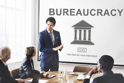 A business meeting illustrates the impact of bureaucracy on the vet sector.