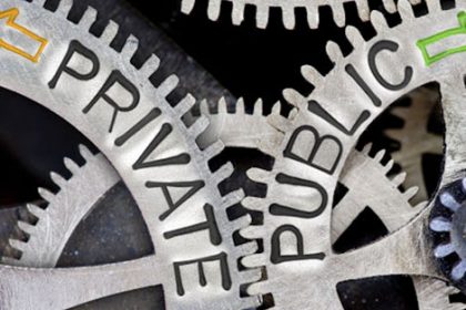 Interlocking gears represent the private and public sectors working together in Australian vet sector.