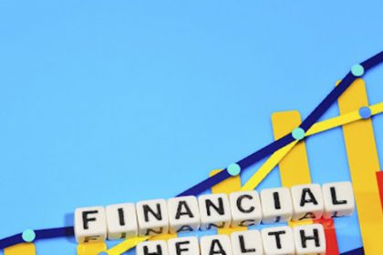 Wooden blocks forming 'Financial Health' represent growth and stability for a vet sector business.