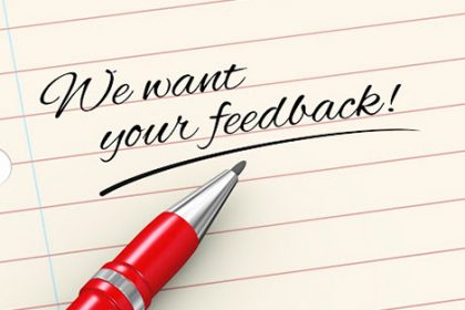 A pen and paper invite feedback, crucial for effective complaint management in RTO training.