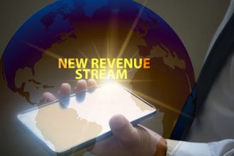 A smartphone displays a world map representing new revenue streams in the vet sector.