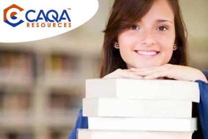 A young woman studies with books, representing helpful vet compliance resources.