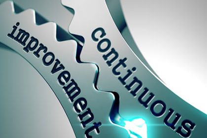 Gears illustrate continuous improvement, a key practice for RTO training organisations.