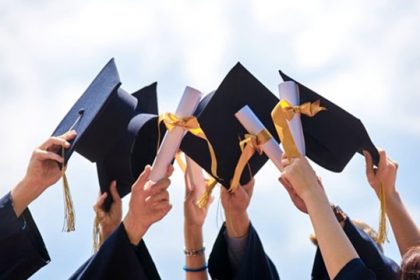 Graduates celebrate at a ceremony, showcasing success in the vet sector.